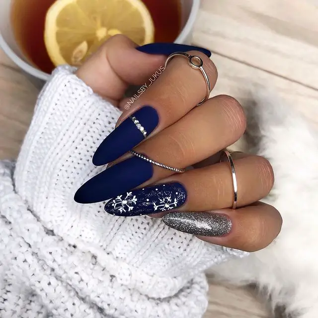Blue Nails with Sparkly Accent and Snowflake Art