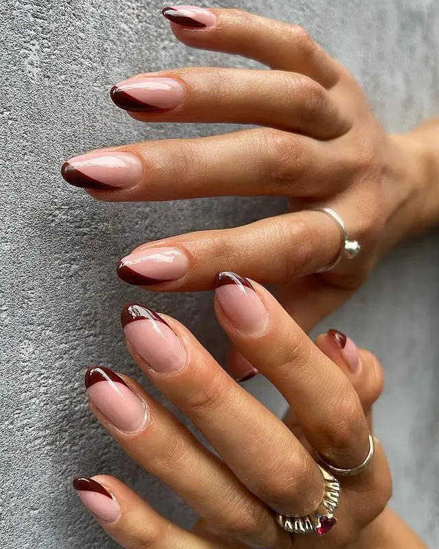 trendy short brown french tip nails