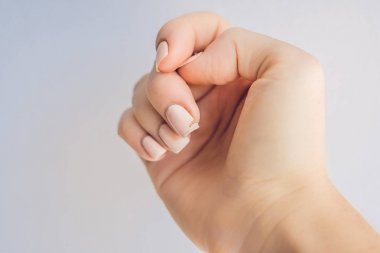 why your nails split in the middle