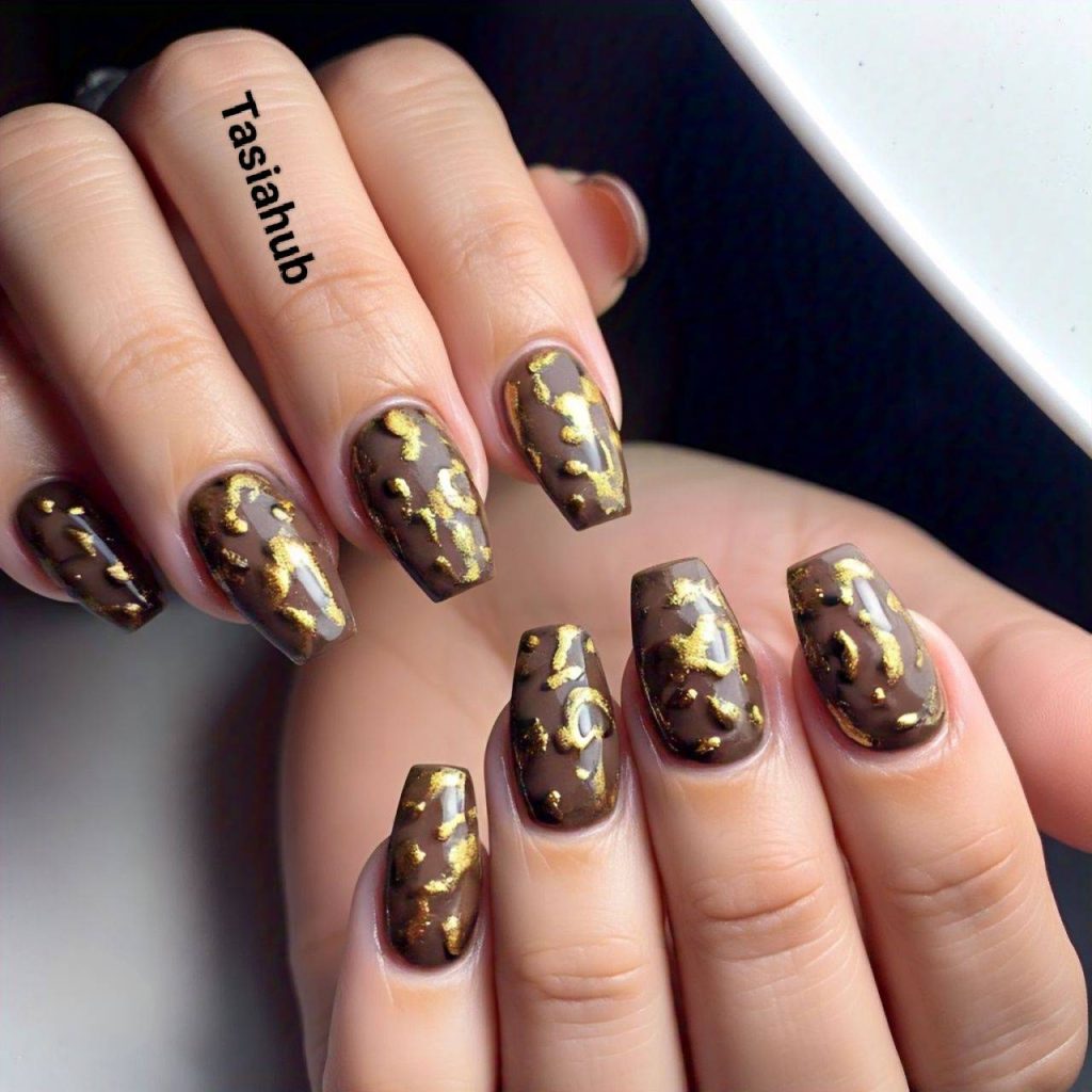 brown nails and gold accents