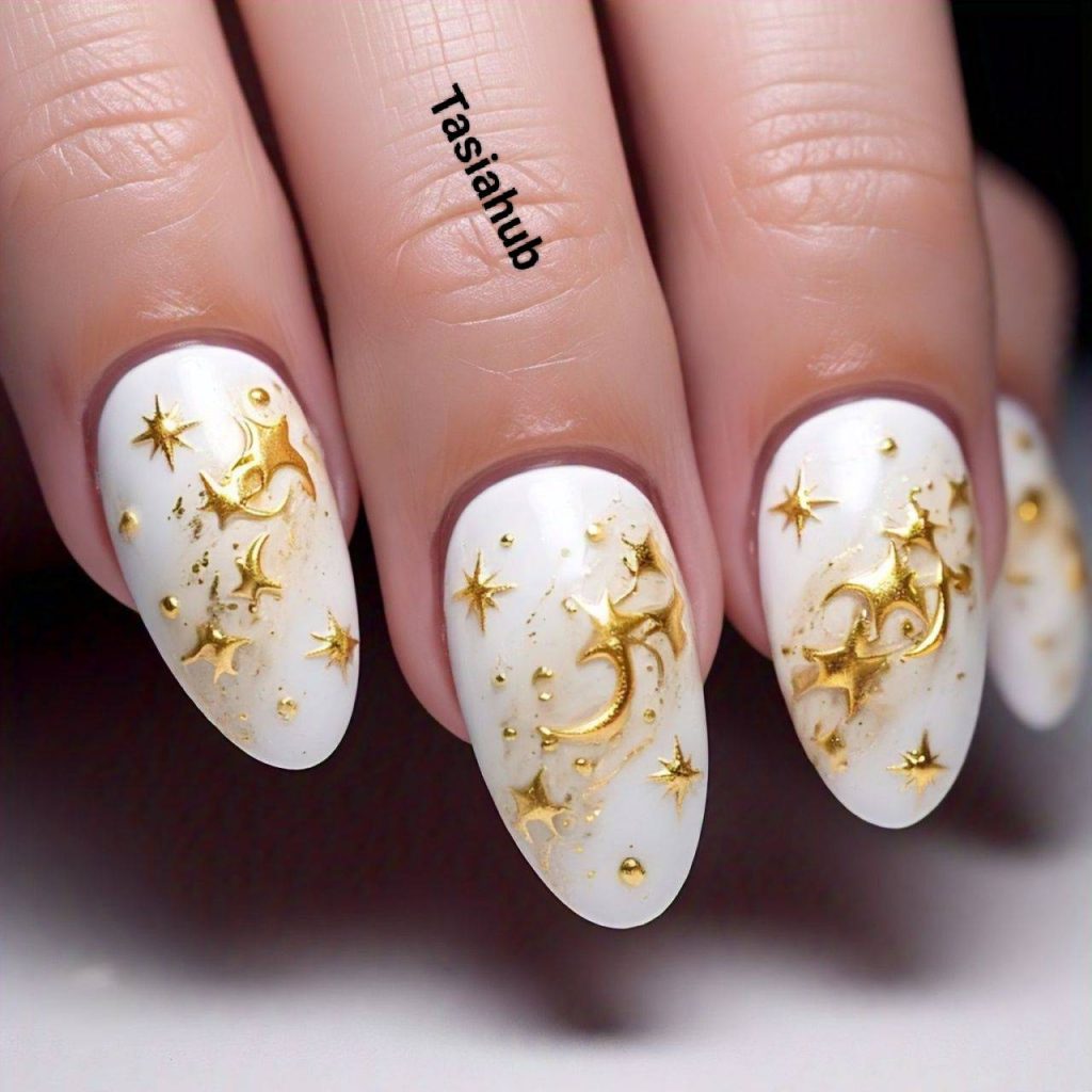 white and gold celestial nails b2