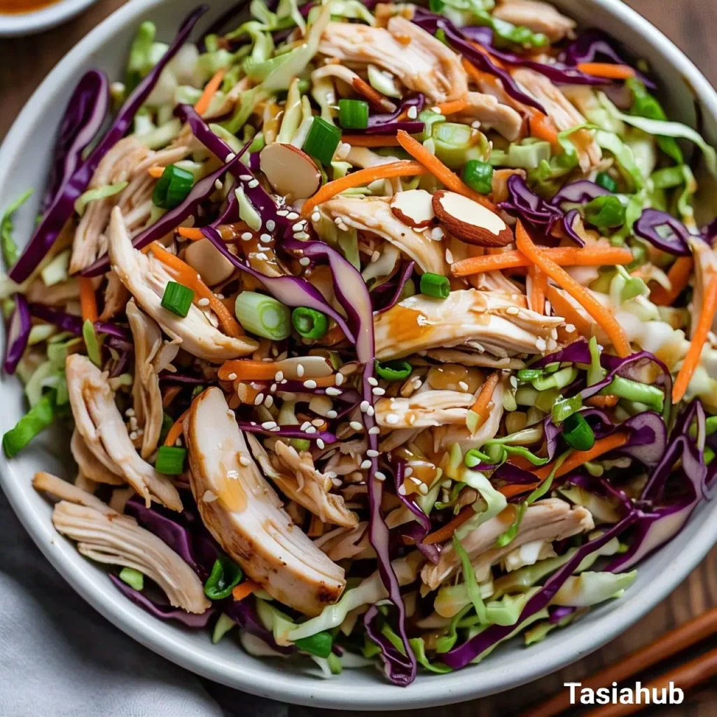 Chinese chicken salad served in a white bowl