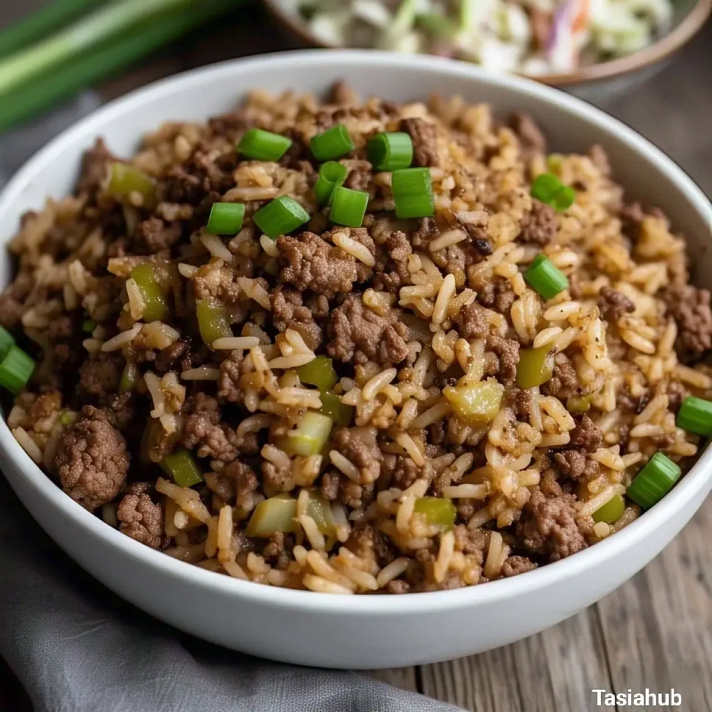 A photo of dirty rice with coleslaw