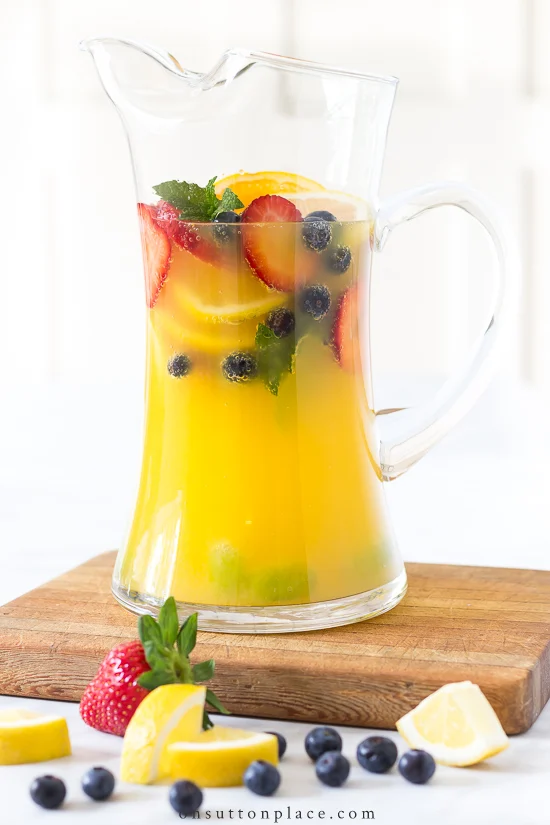 non alcoholic sangria in clear pitcher with fruit